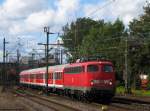 Mit dem Leerpark fr den Verstrkerzug nach Wunstorf rollt 110 449-6 in Hannover ein. August 2011