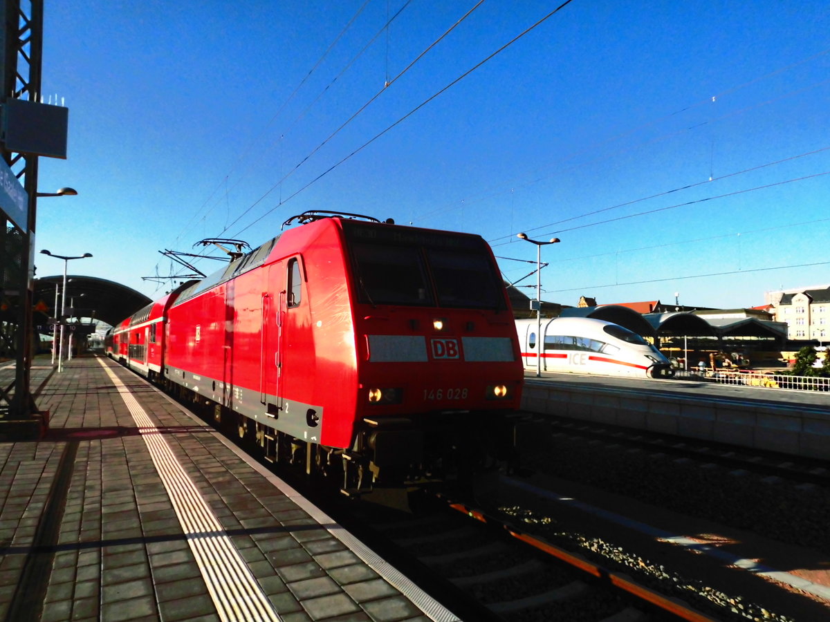 146 028 verl�sst als RE30 mit ziel Magdeburg Hbf den Bahnhof Halle/Saale Hbf am 26.7.18