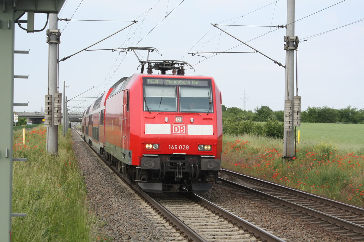 146 029 mit dem RE30 mit ziel Magdeburg Hbf bei der Einfahrt in Z�beritz am 9.6.21