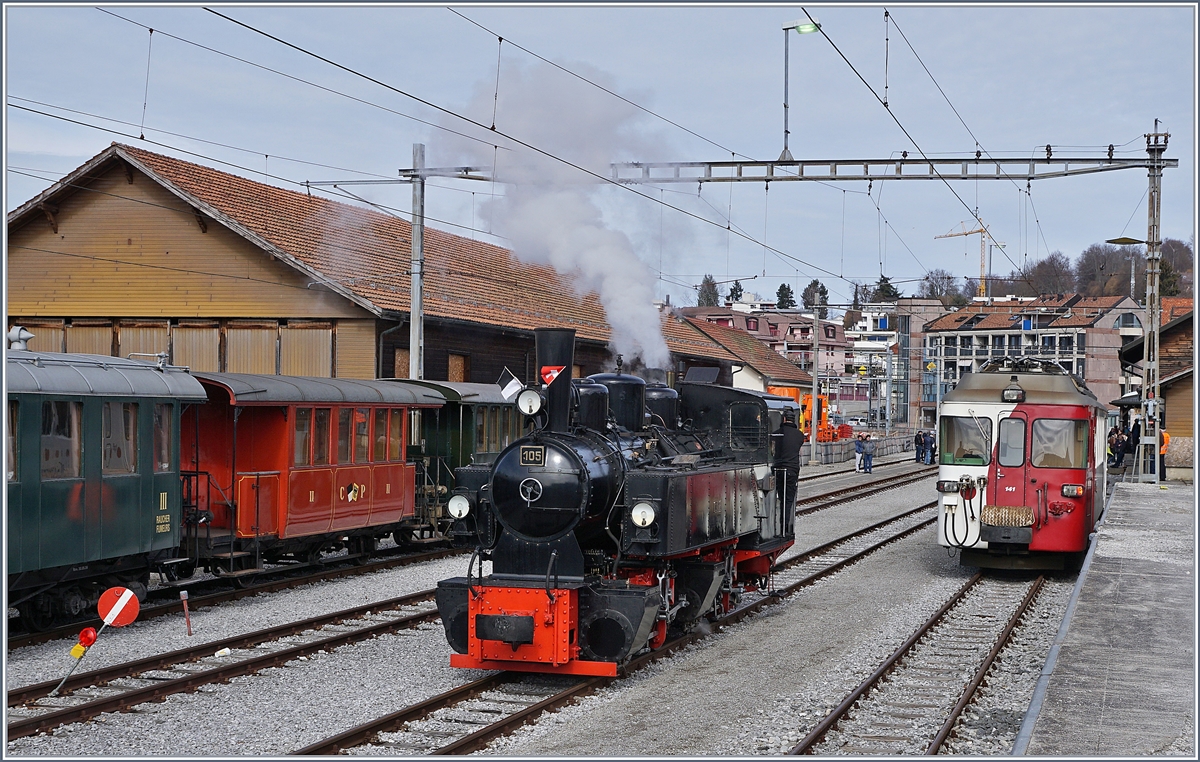 Die Blonay-Chamby G 2x 2/2 105 bei einer Rangierfahrt zum Umfahren ihres Zuges in Chatel St-Denis. 

3. März 2019