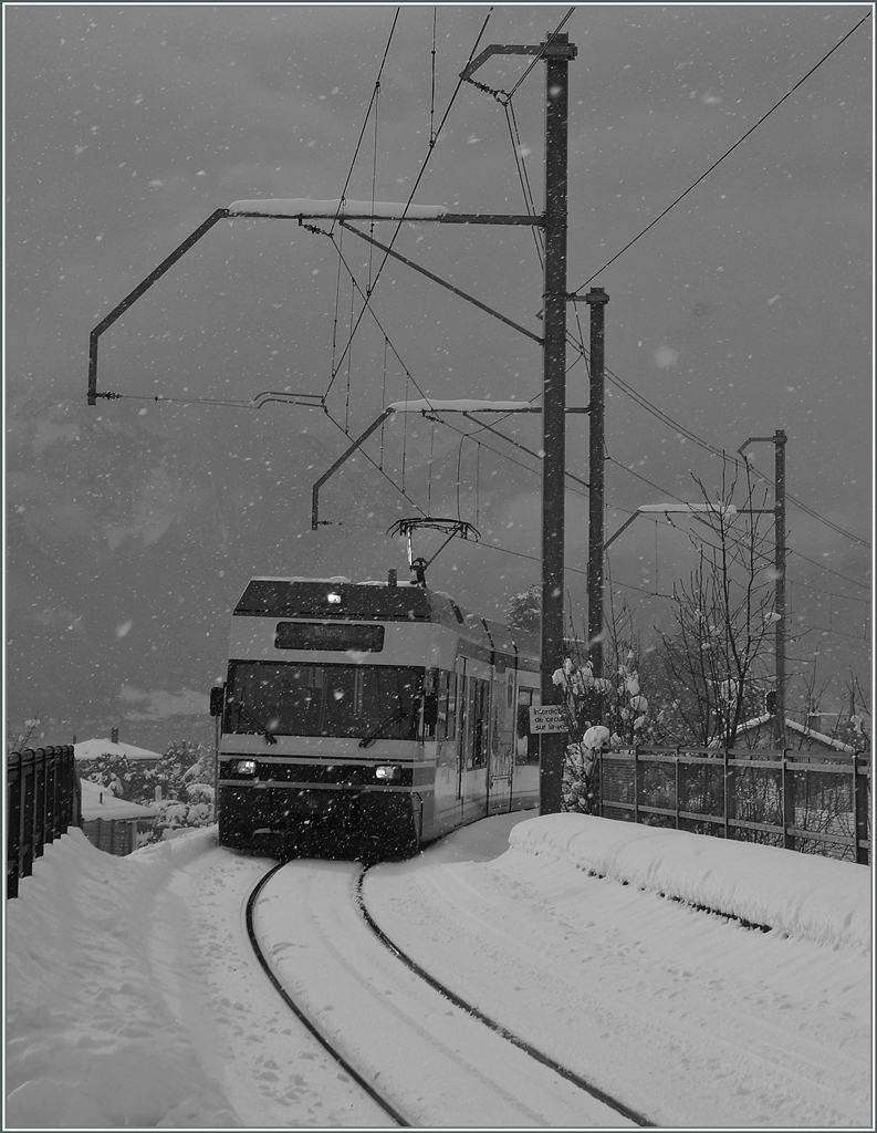 Ein CEV GTW Be 2/6 erreicht Château d'Hauteville.
2. Feb. 2015