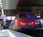 110 449-6 schiebt den RE 11376 an diesem Abend von Dsseldorf nach Kln. Januar 2012