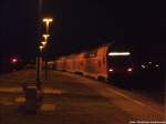 Schlusslicht des Zuges mit ziel Stralsund Hbf gezogen von einer BR 143 bei der Ausfahrt aus Stralsund R�gendamm am 25.11.13