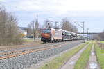 TXL 193 878   Wir brennen f�r was wir tun  mit einem Autozug am Haken gen Karlstadt fahrend In Th�ngersheim. 17.2.2024 
 