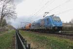 Am 13 M�rz 2021 zieht LTE 186 945 ein Getreidezug durch Alverna.