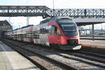 4024 133 und 4024 081 der �BB mit Ziel Schruns/Bludenz beim Verlassen des Bahnhofs Lindau Insel (ehemals Lindau Hbf) am 24.3.21
