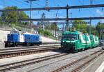 Die beiden BAM MBC Ge 4/4 N° 21 und 22 sind mit einem Kieszug von Apples nach Gland in Morges angekommen und ragieren nun, um den Kieszug über die Rollbockgrube zu schieben.
Im Hintergrund ist eine TRAVYS Diesellok zusehen.

16 April 2026