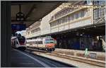 Ein SBB RBDe 560  Domino  und (im Schatten etwas versteckt) ein SRR RABe 523 warten in Lausanne auf die Abfahrt.