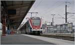 Der SBB LEX RABe 522 232 der mit einem weiteren SBB LEX RABe 522 auf die Rückfahrt nach Coppet wartet.