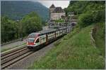 Bei St-Maurice ist ein SBB RABe 511 bei garstigem Wetter unterwegs als RE nach Annemasse unterwegs.