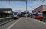 S-Bahn Verkehr in St.Margrethen: SOB RABe 526 056-7 als S 4 nach Sargans und ÖBB 4024 023-6 der Voralberger S-Bahn nach Bregenz.